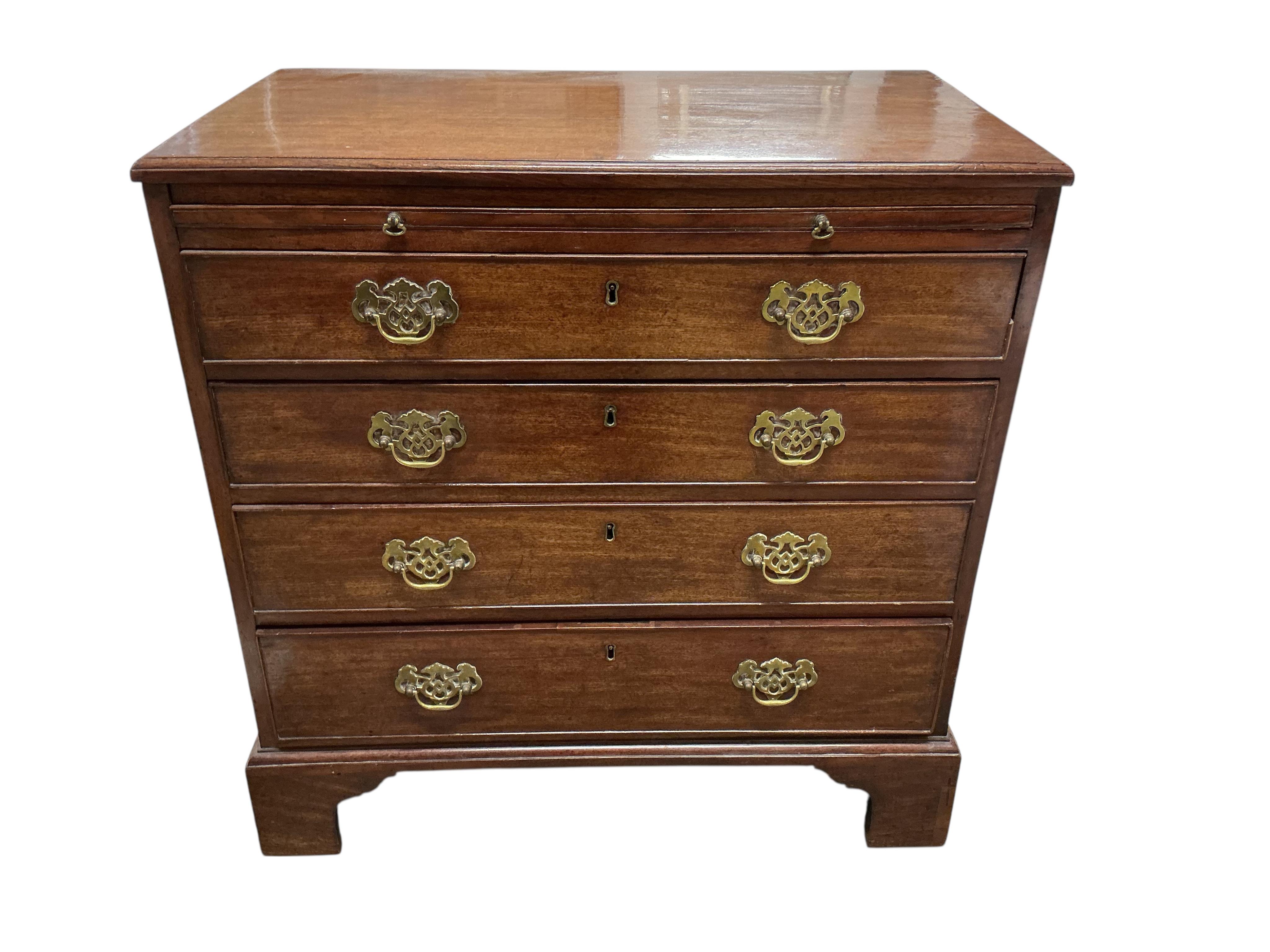A small George III mahogany four drawer chest with brushing slide, width 78cm, depth 46cm, height 79cm